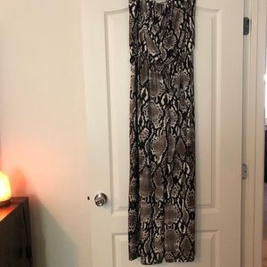 🆕 Sleeveless snake print jumpsuit